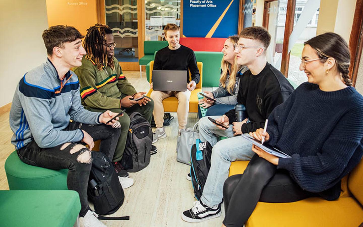 Students sitting and chatting as a group at MIC Limerick