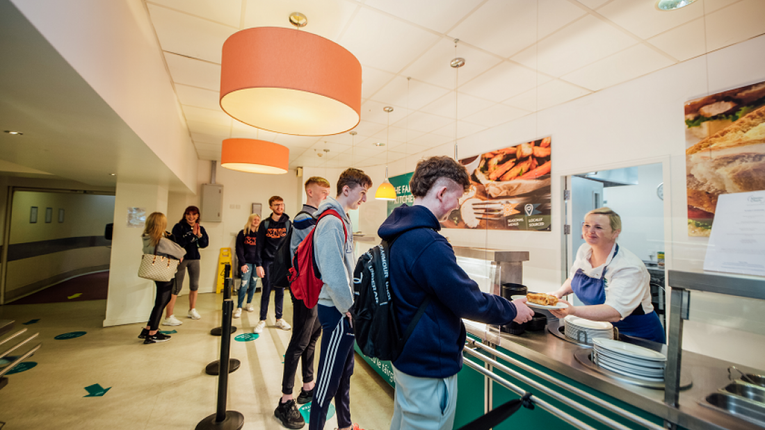 A student getting their food from the MIC Limerick Canteen