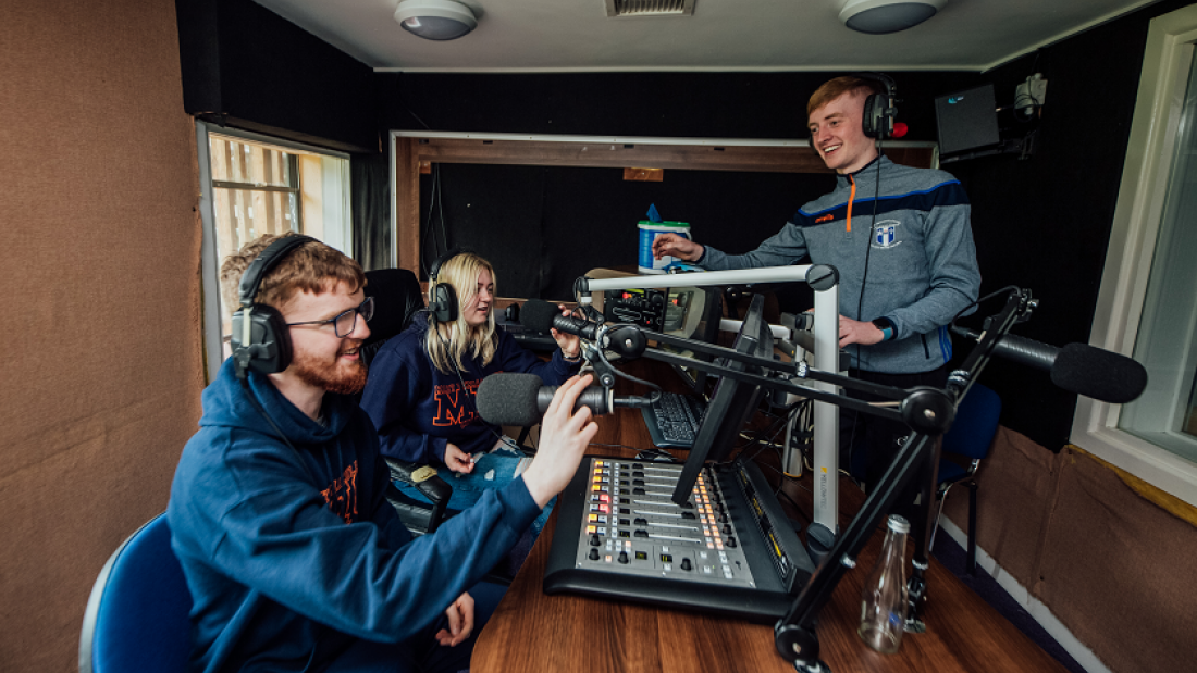 Students presentation a radio show on Wired FM