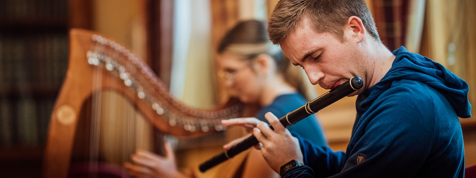 MIC students playing flute and harp as part of Culture Night 2023.