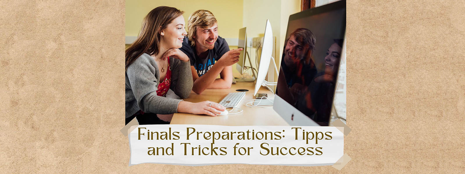 Students sitting at a computer