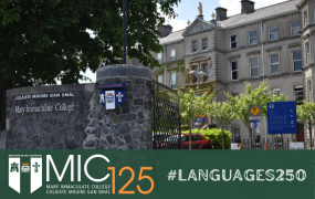 MIC gates and Foundation building with MIC125 logo and #Languages250 logo on green strip at end