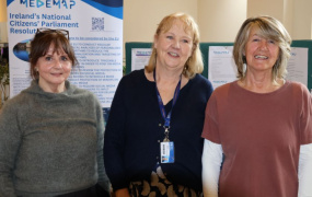 three ladies involved in a research project pose for a photo