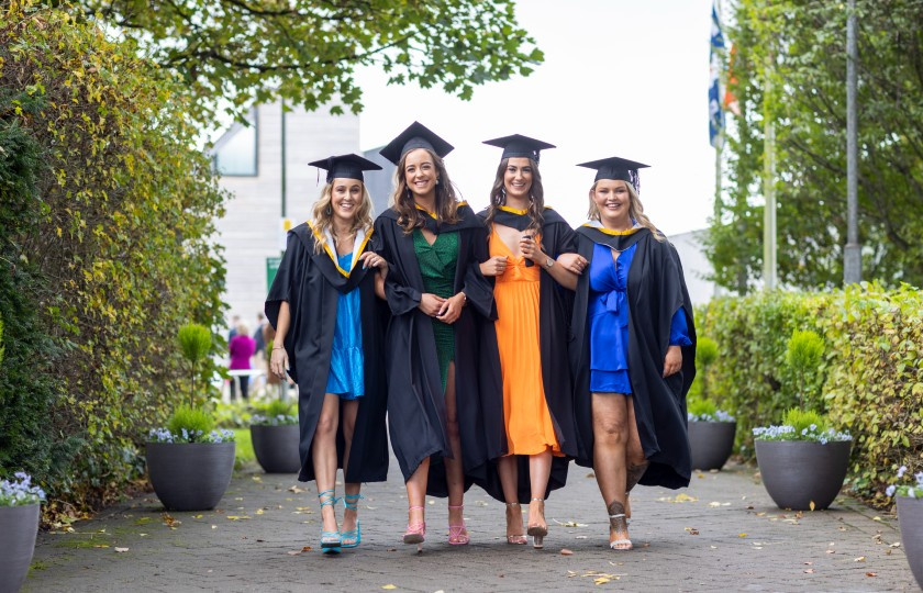 Four girls walking