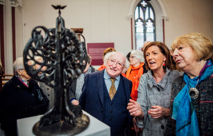 President Higgins, his wife Sabina and the curator of the exhibition, Naomi O'Nolan (centre)