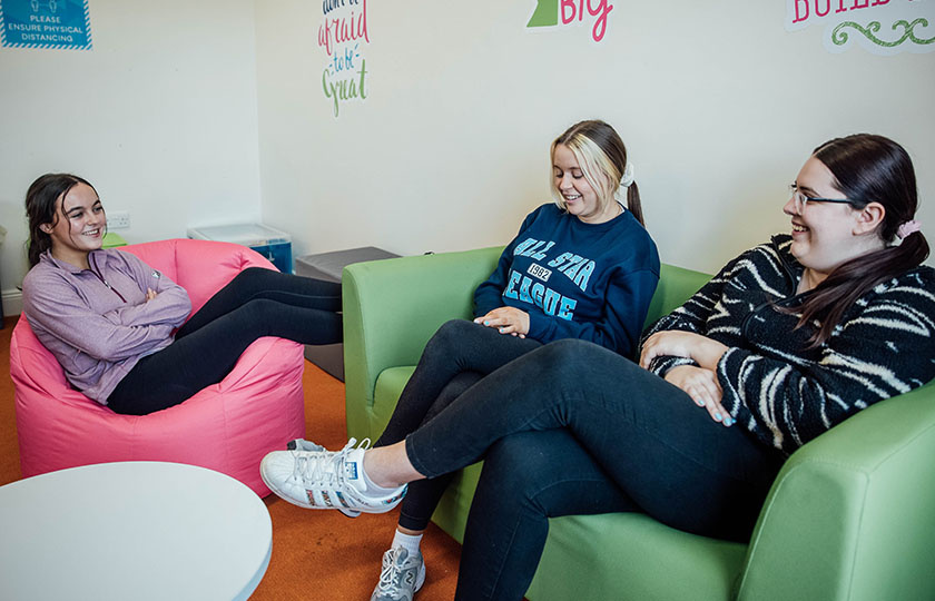 Three female students chatting at the MISU, MIC Thurles