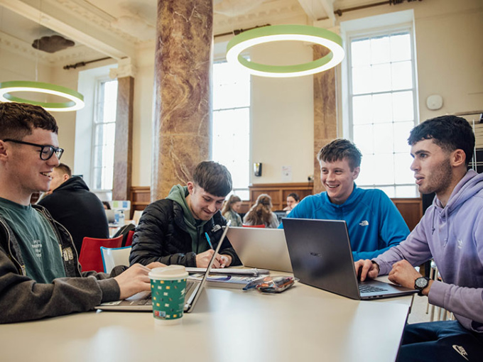 Students studying together in MIC Thurles canteen